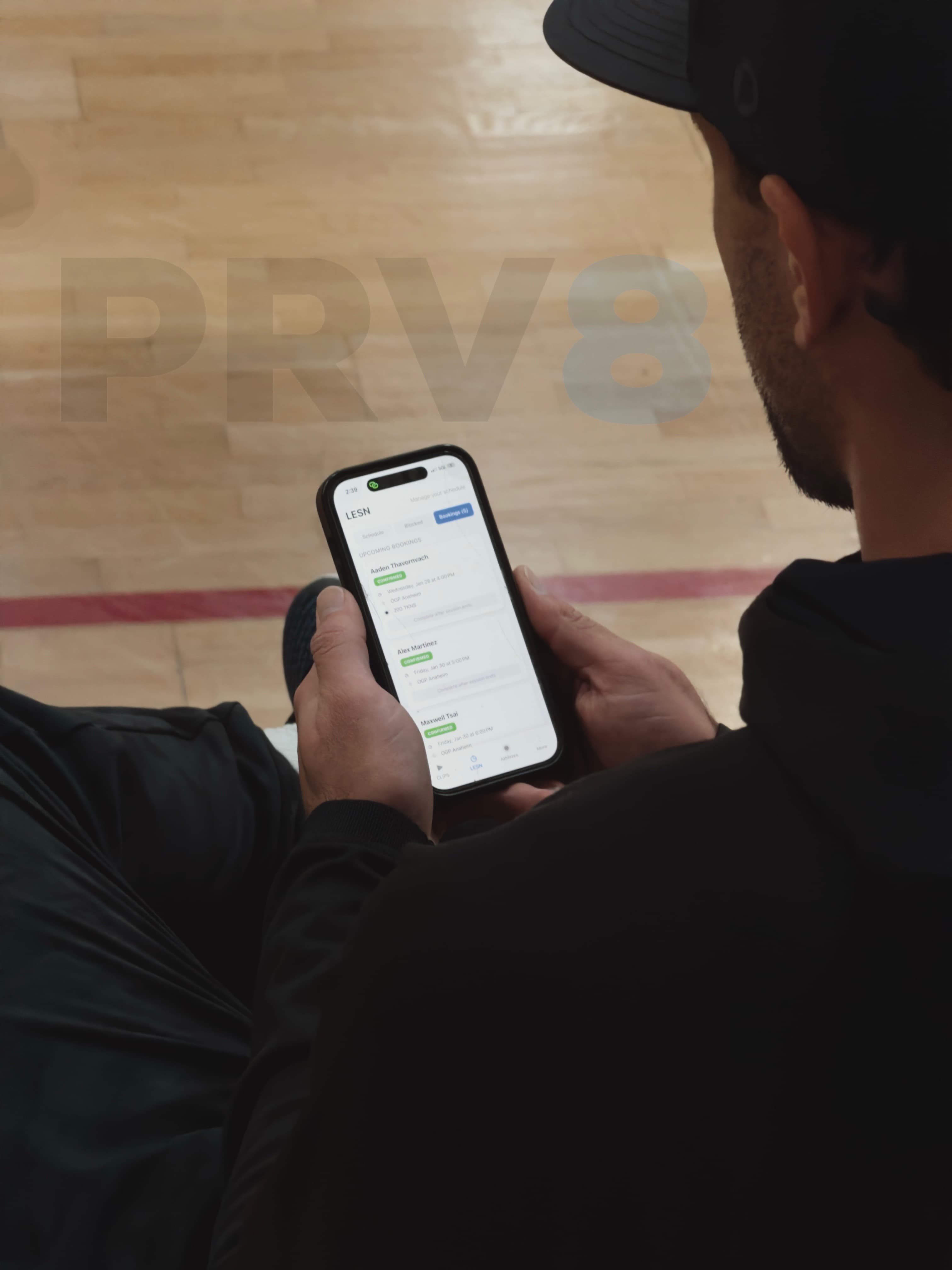 Coach using PRV8 app courtside