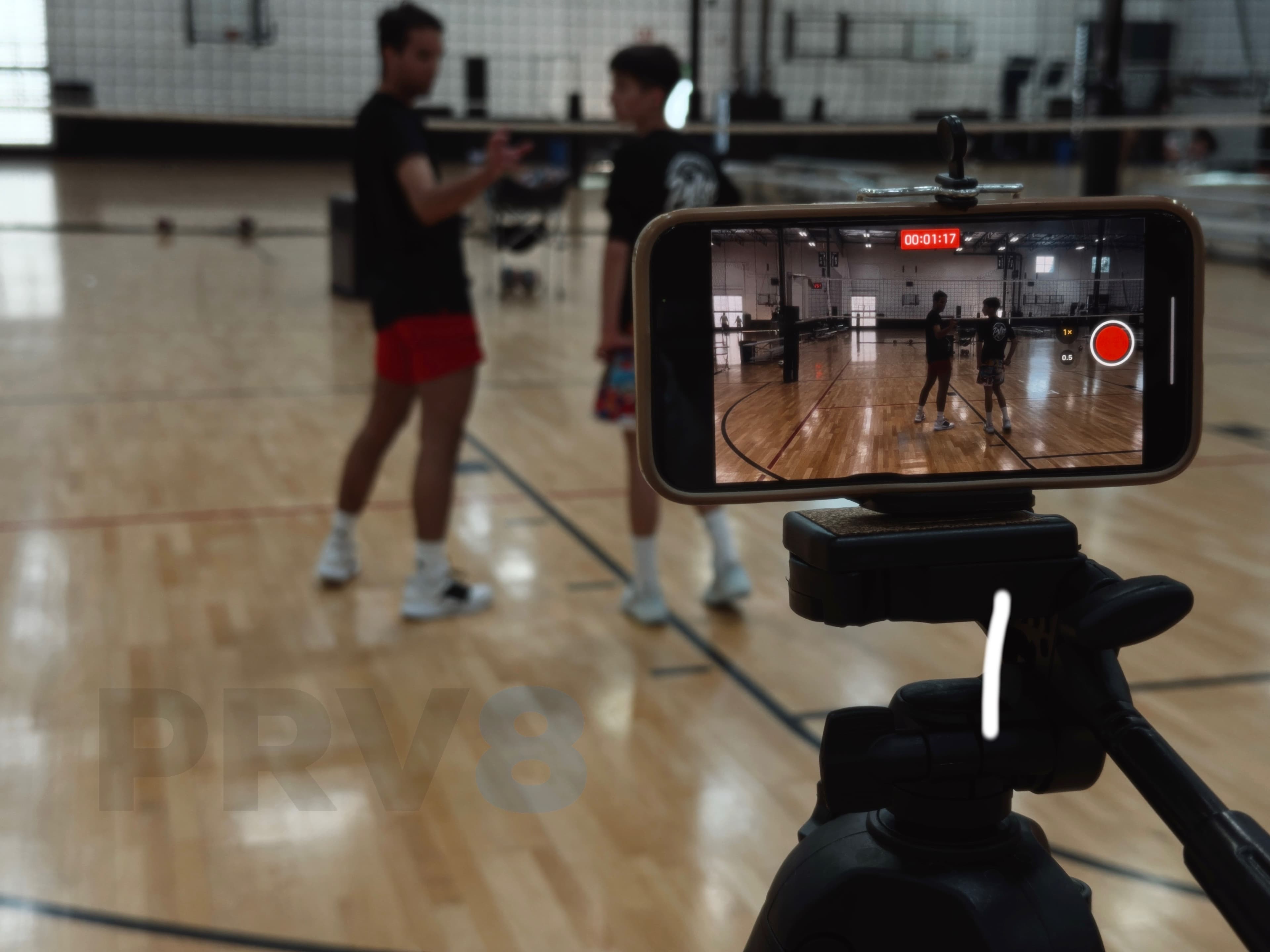 Recording athlete training with phone on tripod